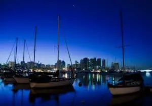 Image of boats with San Diego, CA in the background