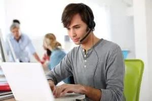 Image of a man providing a tutoring session online as a home-based business