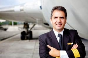 Image of a pilot who works for a company that uses a private jet answering service