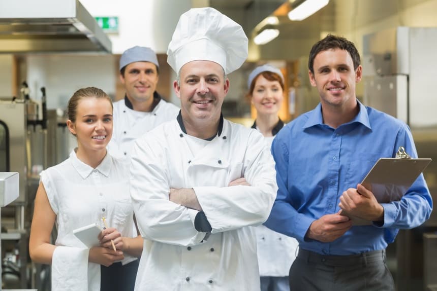 Image of a chef and his staff that use a restaurant answering service