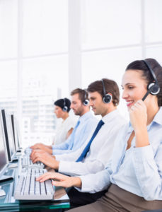Image of a call center team providing dispatch services for taxis and shuttles