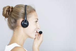 image of a receptionist providing answering services for churches