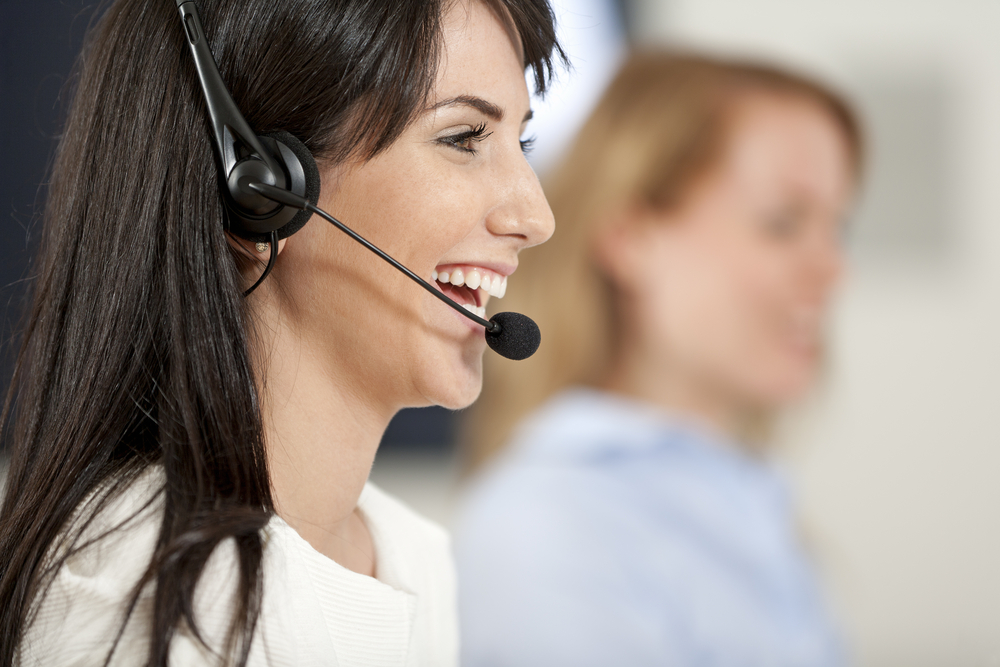 two receptionists providing inbound call center solutions