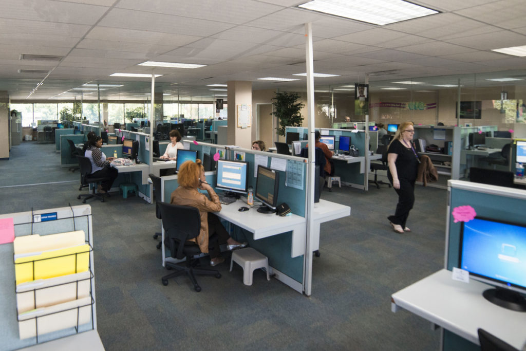 inside of a call center with agents taking phone calls