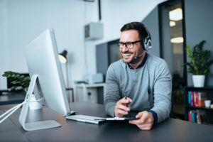 Call center agent helping clients schedule appointments