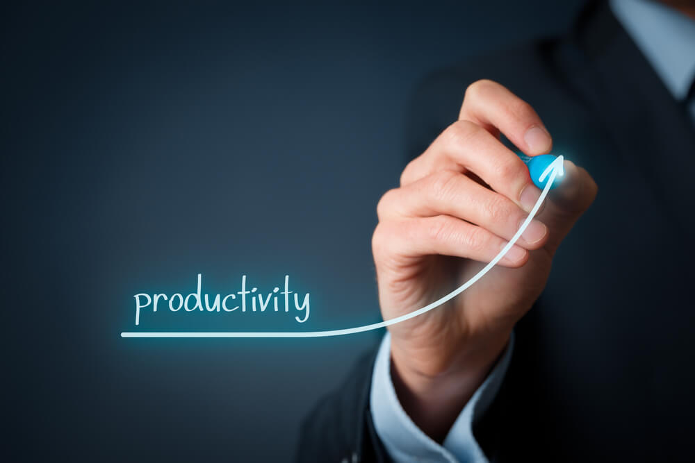 Businessman Utilizing Strategies to Increase Productivity