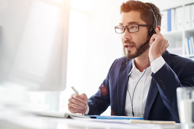 Call Center Agent Talking with a Customer