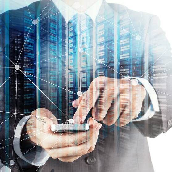 Image of a man with a cell phone initiating his business continuity call center services