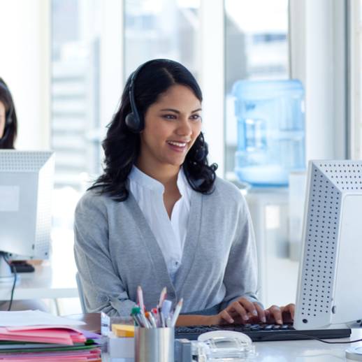 four representatives working in an inbound call center