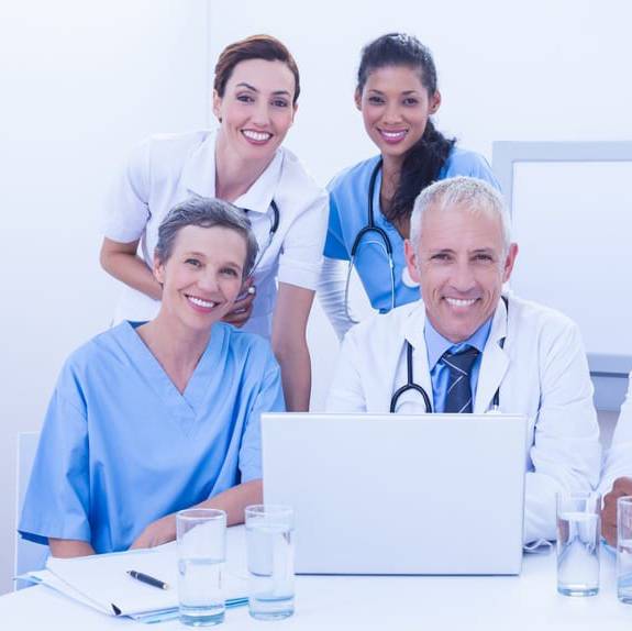 Image of a team of healthcare professionals that use a HIPAA-compliant answering service