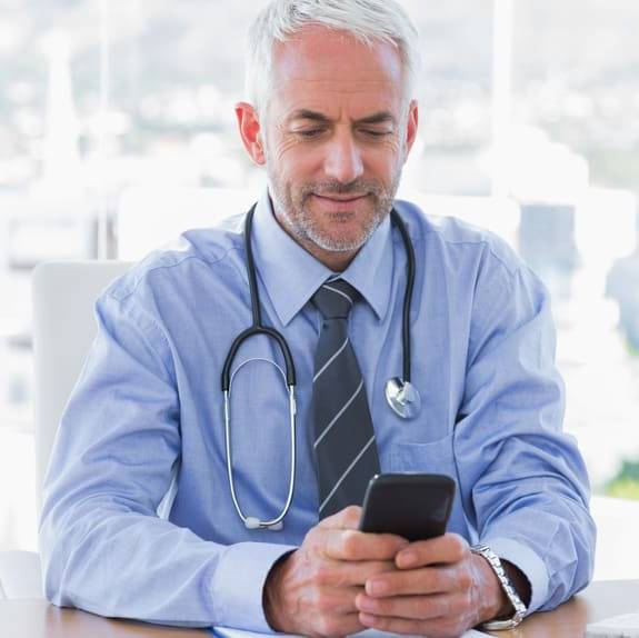 Image of a doctor using a HIPAA compliant medical answering service