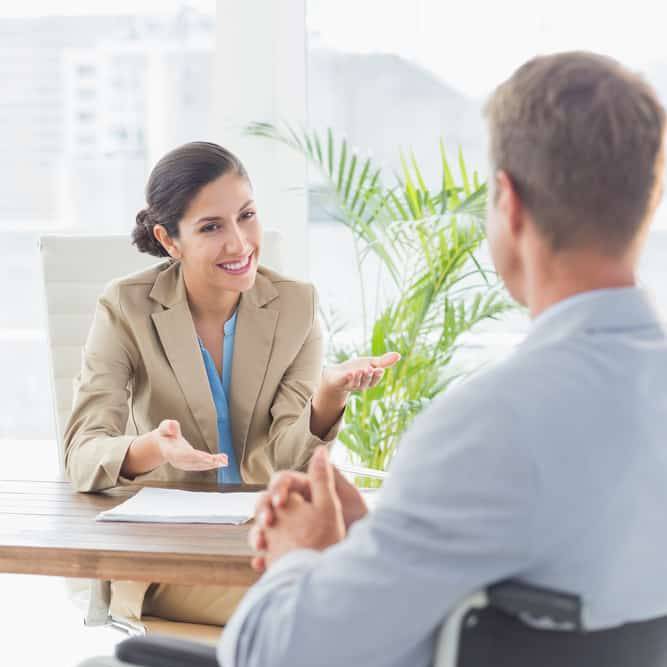Image of a client speaking with an attorney that uses an injury lawyer answering service